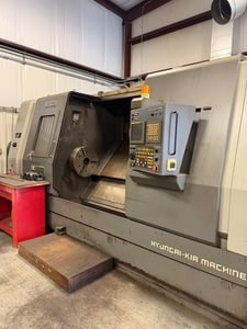 Hyundai Kia #SKT460, CNC lathe, 22" swing, 21" chuck, 4.5" bar, 29" dia., 52" lgth, 2000 RPM, Fanuc 21i-TB