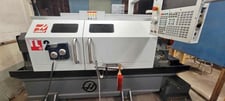 Haas #TL-2, CNC Lathe, 20" swing, 48" centers, 16" turning diameter, 10" chuck, 12 HP, 2000 RPM, tailstock