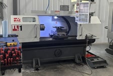 Haas #TL-1, CNC Lathe, 20" swing, 30" centers, 16" turning diameter, 8" chuck, 12 HP, 2000 RPM, 4-station