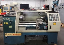 Bridgeport Romi #EZ-Path-II, CNC lathe, 20" swing, 10" chuck, 3-jaw, 2.5" bar, 10 HP, 3500 RPM, tailstock