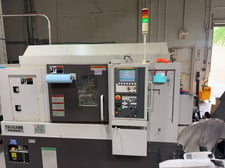 Tsugami #M08SY, CNC lathe, 8" chuck, 2.87" bore, 2.5" bar, 19.9" centers, 4500 RPM, 15 HP, Fanuc 0i-TD