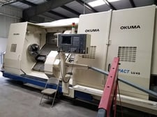 Okuma #Impact-LU45, 33" swing, 24" chuck, 10.2" bar, 121" centers, 23" diameter, OSP-E100L, 50 HP, 2002
