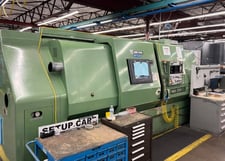 Mori Seiki #SL-45A/1500, 26.3" swing, 15" chuck, 4" bar, 60.2" centers, 19.3" diameter, Fanuc CNC, 1989