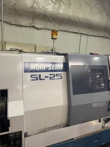 Mori Seiki #SL-25, 22.4" swing, 10" chuck, 3.1" bar, 24.6" centers, 10.2" diameter, 12 station turret, 1997