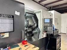 Takisawa #LA-250YS, 23.6" swing, 10" chuck, 3" bar, 29" centers, 14.56" diameter, Fanuc 32i-B, 15 station