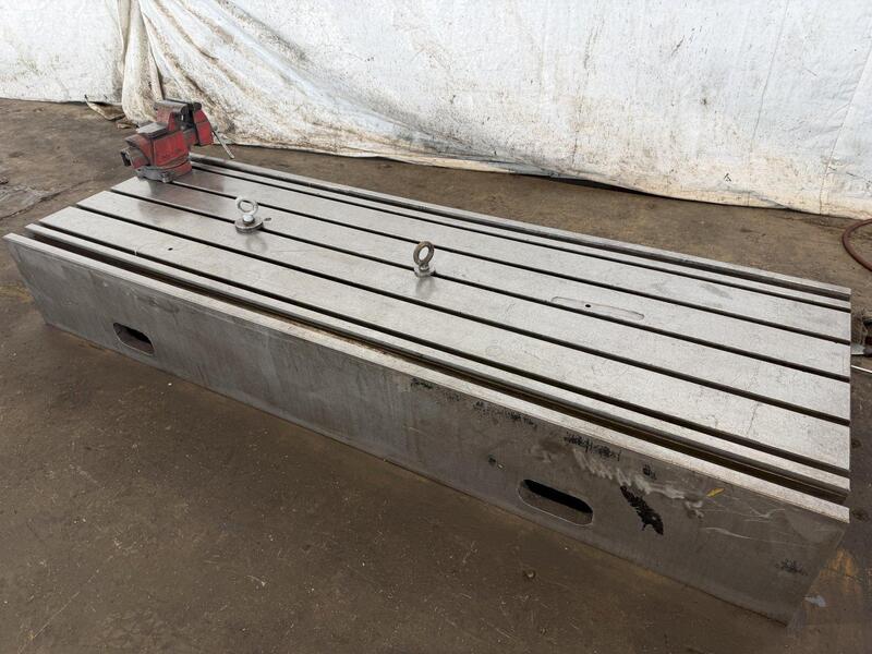 83" L x 28" width x 12" H T-slotted machine riser table