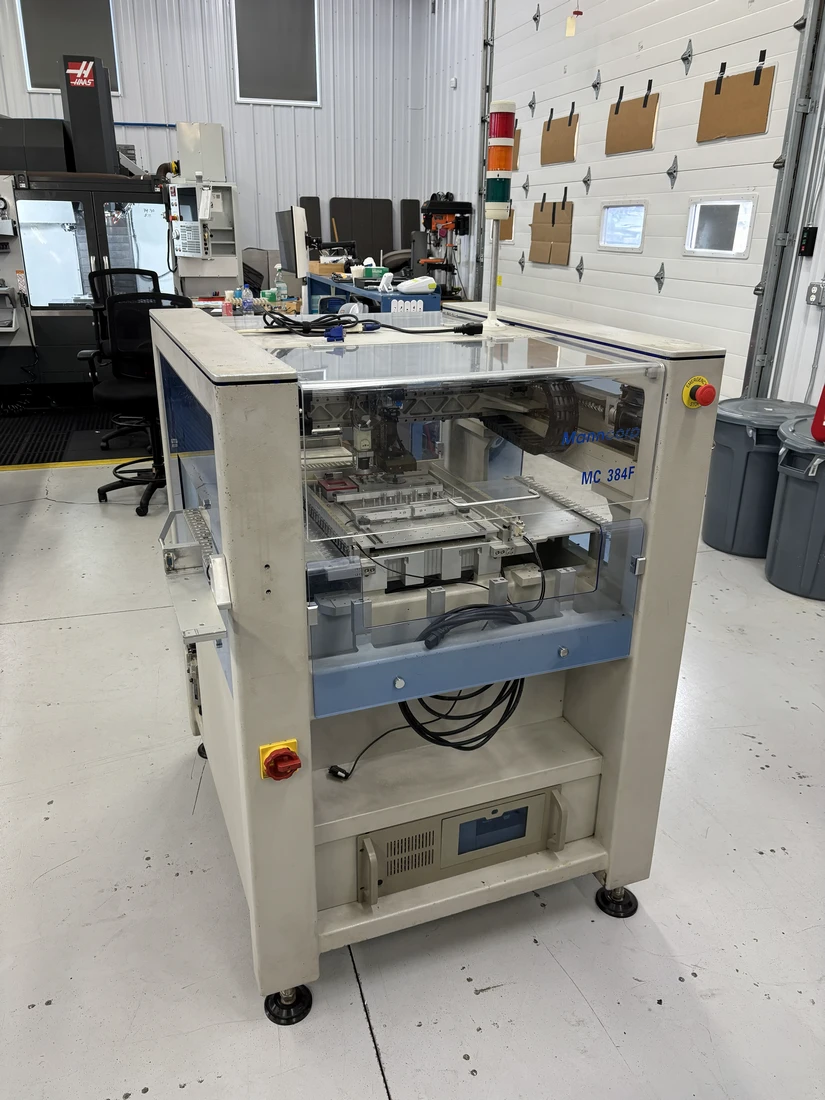 Manncorp #MC-384F, SMT pick and place machine, 4,000 components/hour, 9-13/16" x 9-13/16" area, 2009