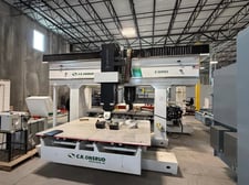 Onsrud #F98E12W6, 5-Axis CNC router, (2) 48" x 72" tables, 12 HP nutating spindle, 12-position ATC, Fanuc