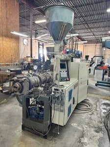 Cincinnati Milacron #CM-55, 55mm conical twin screw extruder, 25:1 L/D, oil cooled, vacuum vented, 40 HP, 1997