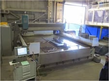 Flow #Mach-4-4030c-X5, 5-Axis CNC waterjet cutting system, 10.1' x 13.1' table, 100 HP pump, 94,000 PSI