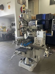 Acra #LCM-50, Vertical Mill, 9" x 50" table, 37" x12" x5" trvls, 3 HP, 60-4500 RPM, Newall digital read out