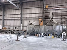 L S Industries, conveyor shot blaster, 24" width x 42" H opening, (4) 15 HP wheels, 1999