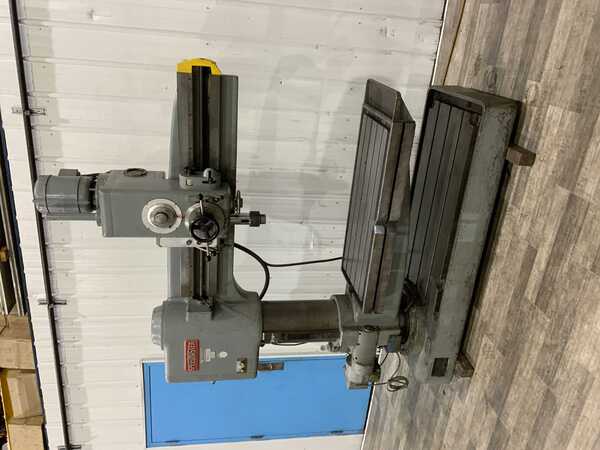 4' -10" Speedmaster, radial arm drill, power table elevation, tapping, 46" x 22" swing away table, 5 HP