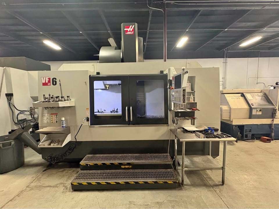Haas #VF-6/50, CNC vertical machining center, 64" X, 32" Y, 30" Z, 7500 RPM, 30 HP, 30 automatic tool