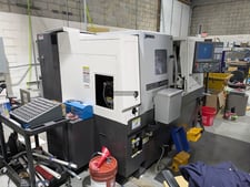 Okuma #Genos-L400II-e, CNC lathe, 12 station turret, OSP-P300LA-e control, chip conveyor, 220 V., 2022