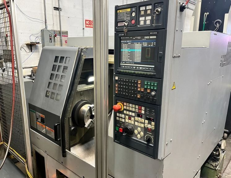 Mori Seiki #CL-2000B, CNC lathe, 8" chuck, chip conveyor, coolant system, Fanuc M-10iA robot loader