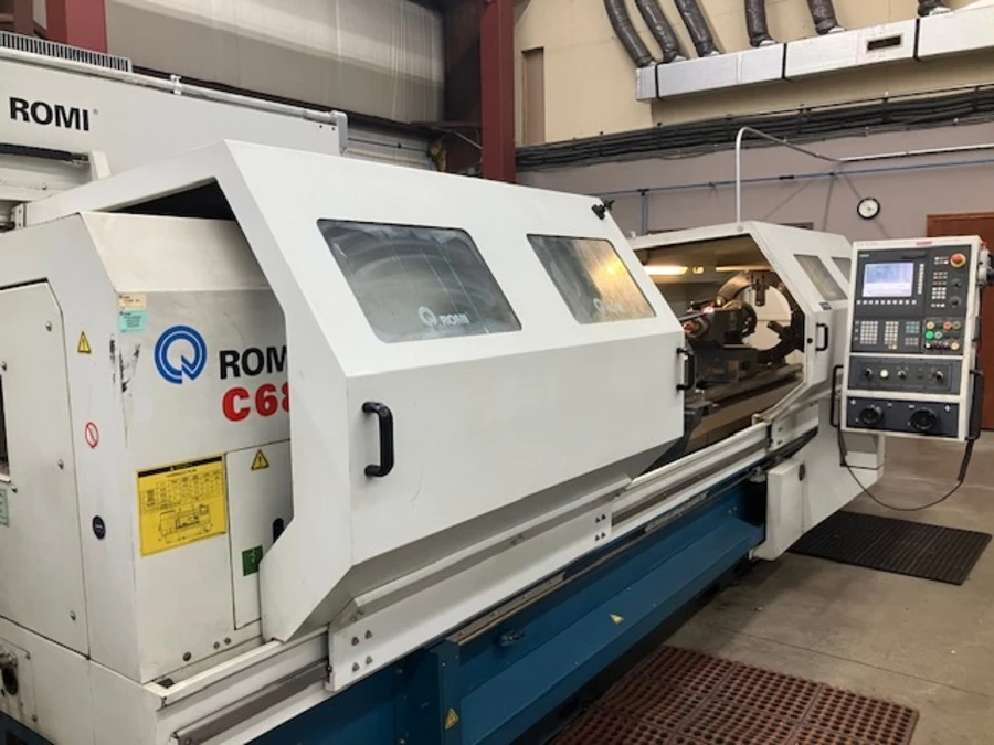 Romi #C-680, CNC lathe, 24" swing, 6.5" spindle hole, 120" centers, 79.7" turning length, 16.9" swing over