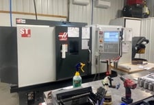Haas #ST-30, CNC lathe, 31.7" swing, 3" bar, 10" chuck, 26" centers, 21" turning diameter, 12 station turret