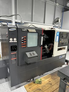 Samsung #SL-2000, CNC lathe, 2" bar, 8" chuck, 15" turning diameter, 6,000 RPM, 12 station turret, Fanuc CNC