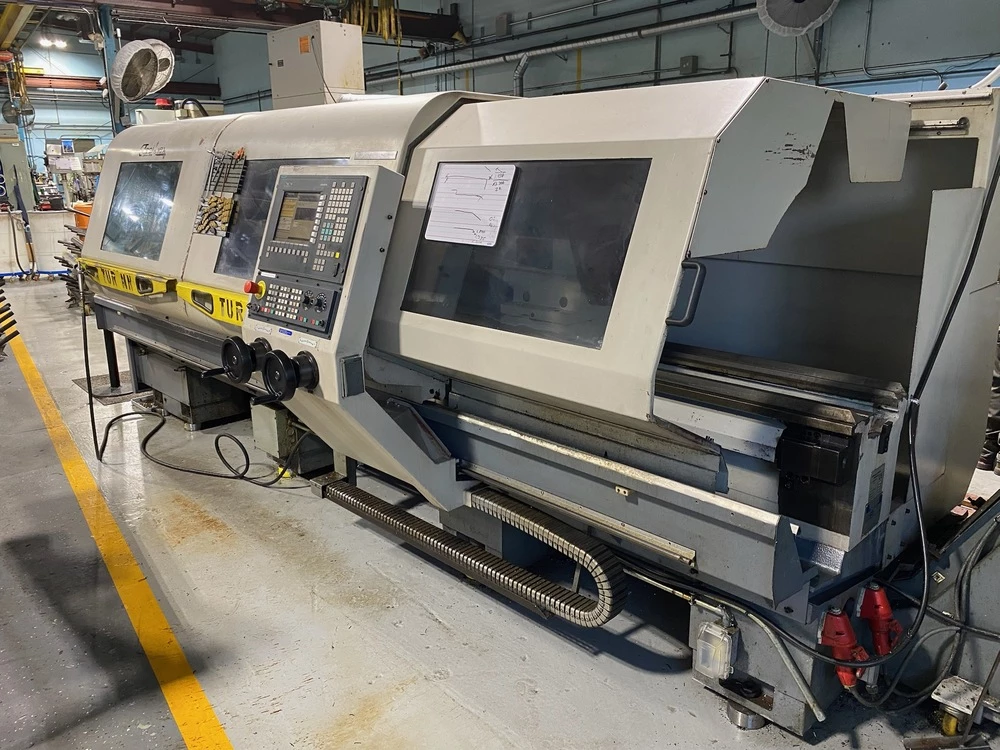 Toolmex #TUR-630-MN, CNC lathe, 3.5" bar, 12" chuck, 118" centers, 8 station turret, Siemens control, 2005