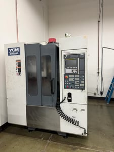 YCM #XV560A, vertical machining center, 22" X, 16" Y, 17.7" Z, 10,000 RPM, 20 automatic tool changer, CAT 40