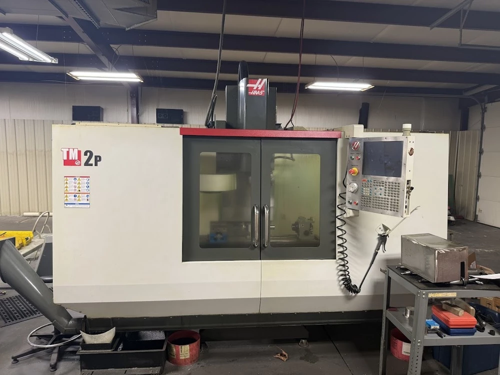 Haas #TM-2P, vertical machining center, 40" X, 16" Y, 16" Z, 6,000 RPM, 10 automatic tool changer, CAT 40