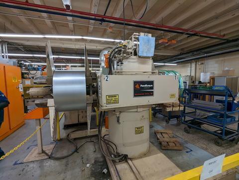 10000 lb. Feed Lease / PA, double end coil reel & powered straightener comb., 20" x .095" stock, 60" OD