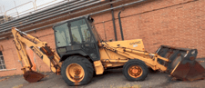 Ford New Holland #555C, tractor loader, 4WD, diesel engine, 85 HP, enclosure cab, Rear backhoe w/ stabilizers