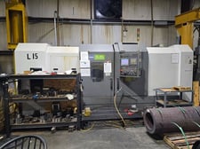 DMC #DL-40L, CNC Lathe, 29.5" swing, 65.2" machining length, 20.4" turning diameter, 18" hydraulic chuck, 30