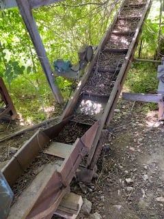 Waste Incline Conveyor, 8' under peeler, adjustable height