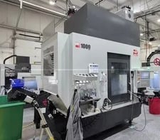 Haas #UMC-1000, 5-Axis CNC vertical machining center, 40" X, 25" Y, 25" Z, 15000 RPM, 30 HP, 50 side mount