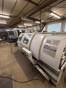 Milltronics #ML-18, CNC Lathe, 18.7" swing, 60" machining length, 2.5" bar, 15 HP, 2600 RPM, tailstock