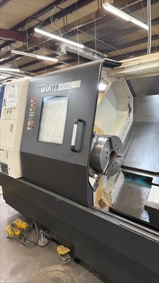 Hyundai Wia #L400LC, CNC Lathe, 28.5" swing, 24.8" turning diameter, 83.5" between centers, 15" chuck, 4.6"