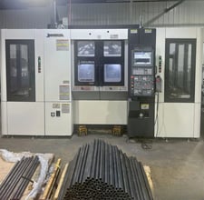Okuma #2SP-2500H, twin spindle CNC chucker lathe with gantry loader, OSP-P300LA, (2) 3-jaw 10" chucks, 2.44"