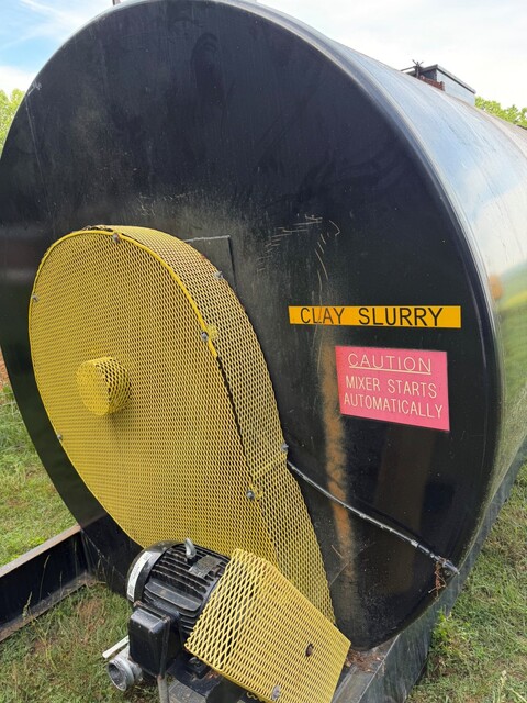 90000-14000 gallon 108" diameter x 360" long, Slurry Tanks, agitators inside, motors attached, professionally
