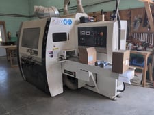 Leadermac #LMC-418S, 4-Head Moulder, 80 FPM feed, heat-treated cast iron frame, independent spindle motors