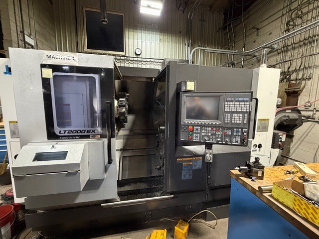 Okuma #LT-2000EX, CNC turning center, OSP-P300LA, twin 16 position turrets, sub spindle, 15.7" swing, 2" bar