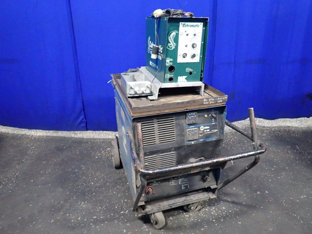 Miller #CP-302, Mig Welder w/ Cobramatics Wire Feeder, 300 Amps, 200/230/460 V., 3 Ph.