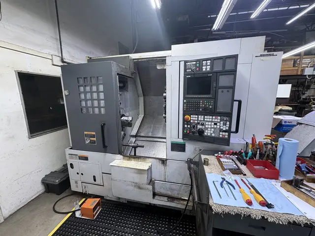 Mori Seiki #NL-1500/500, CNC lathe, 36.4" swing, 14" diameter, 20.2" L, 2" bar, 6000 RPM, 15 HP, 6" chuck, 12