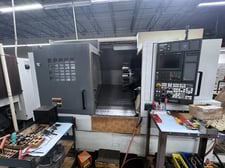 Mori Seiki #NL2500/700, CNC lathe, 36.4" swing, 14" dia., 27.7" lgth, 3.1" bar, 3.6" bore, 4000 RPM, 12