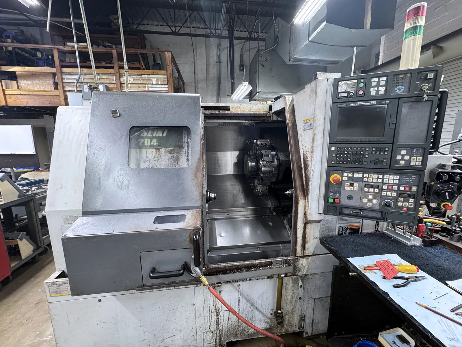 Mori Seiki #SL-204MC, CNC lathe, 26.8" swing, 15.3" dia., 19.5" centers, 8" chuck, 2" bar, 20 HP, 4500 RPM
