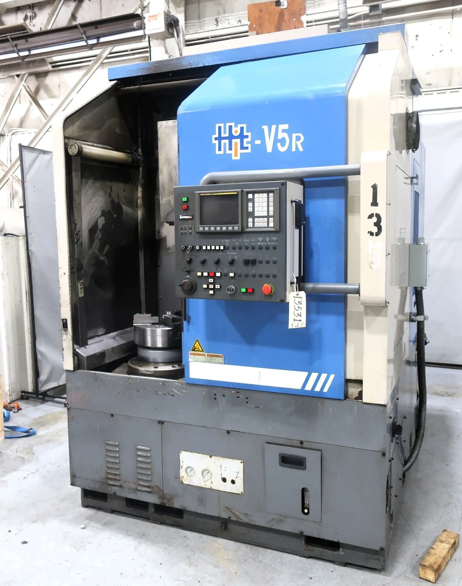 Hyundai #HIT-V5R, CNC Lathe, 15" chuck, 21.6" swing, 2000 RPM, 30 HP, chip conveyor, 2000