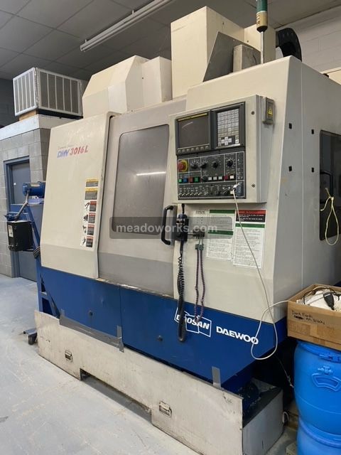 Daewoo Doosan #DMV3016L, 4" Axis CNC Vertical Machining Center, Fanuc Series 0i-MB control, new spindle, 220