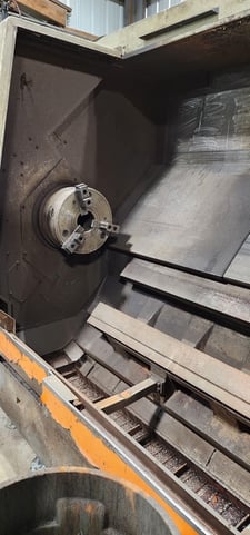 Dainichi #F50, 7" spindle bore, Fanuc 15-T, 80" centers, chip conveyor, live center, 3-jaw 15" chuck, 50 HP