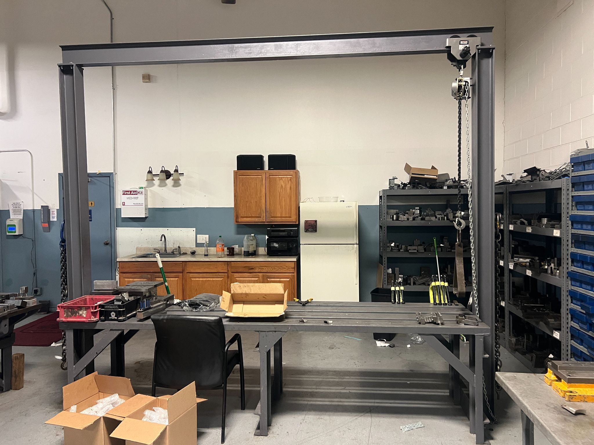 120" x 30" x 31" Die table, 1 ton chain fall hoist, 60" under hoist, 102" overall height