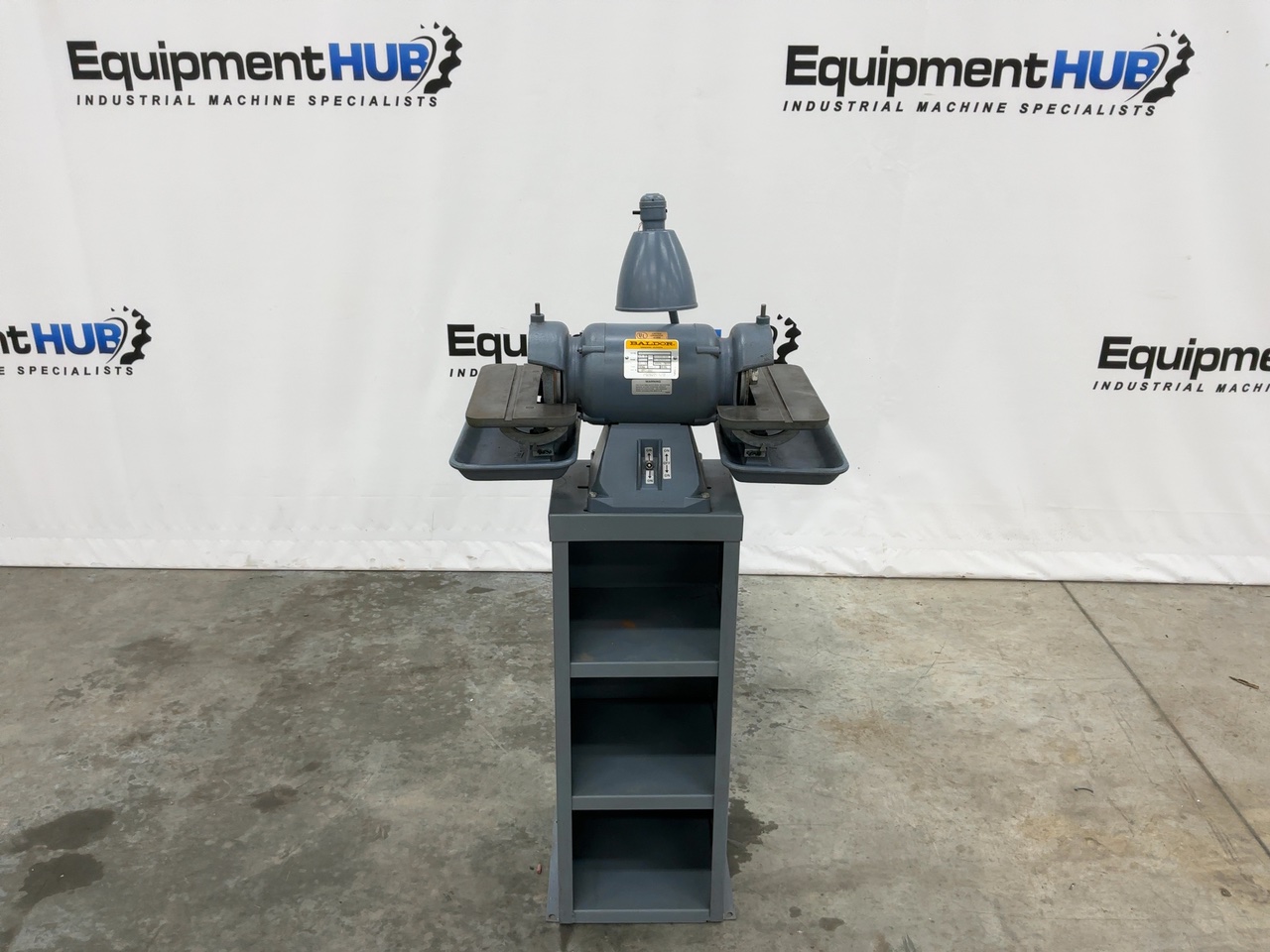 6" Baldor #510, bench grinder with pedestal stand, (2) wheels, dual tilting work tables, forward/reverse