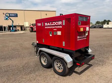 65 KW Baldor #TS80T, diesel generator set, trailer/SAE enclosure, voltage selector switch, John Deere engine