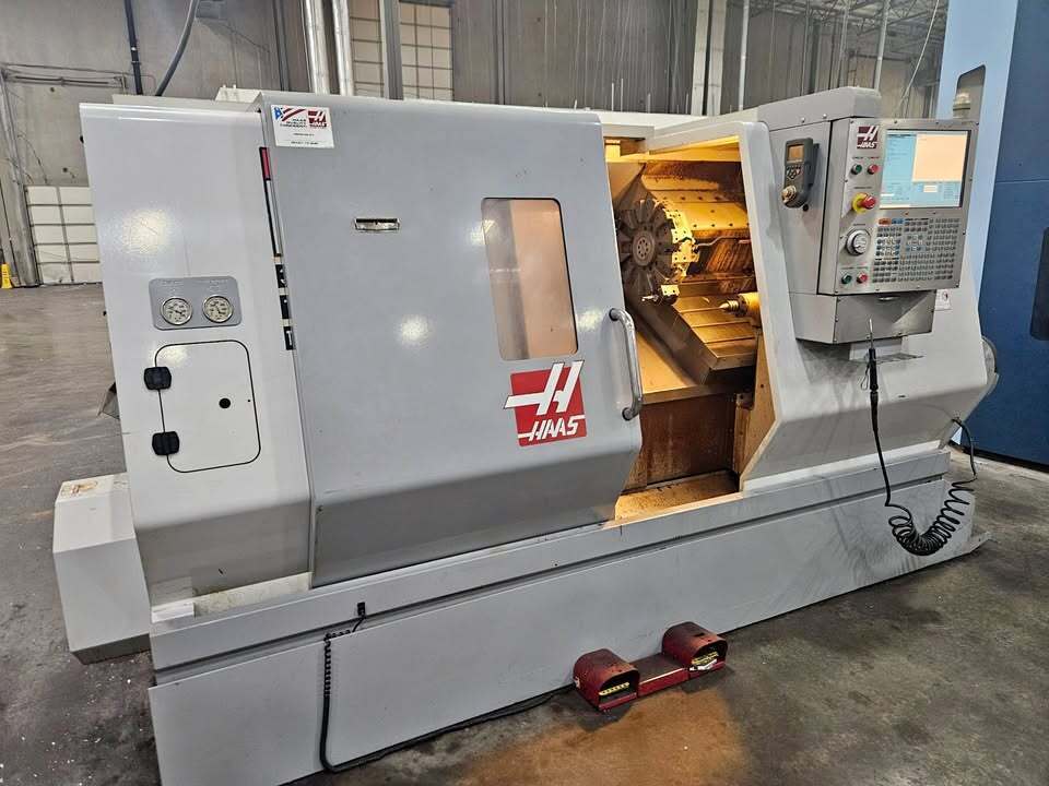Haas #SL-30T, CNC lathe, 34" machining length, 17" turning diameter, 10" chuck, 3" bar, 30 HP, 2,400 RPM, 12