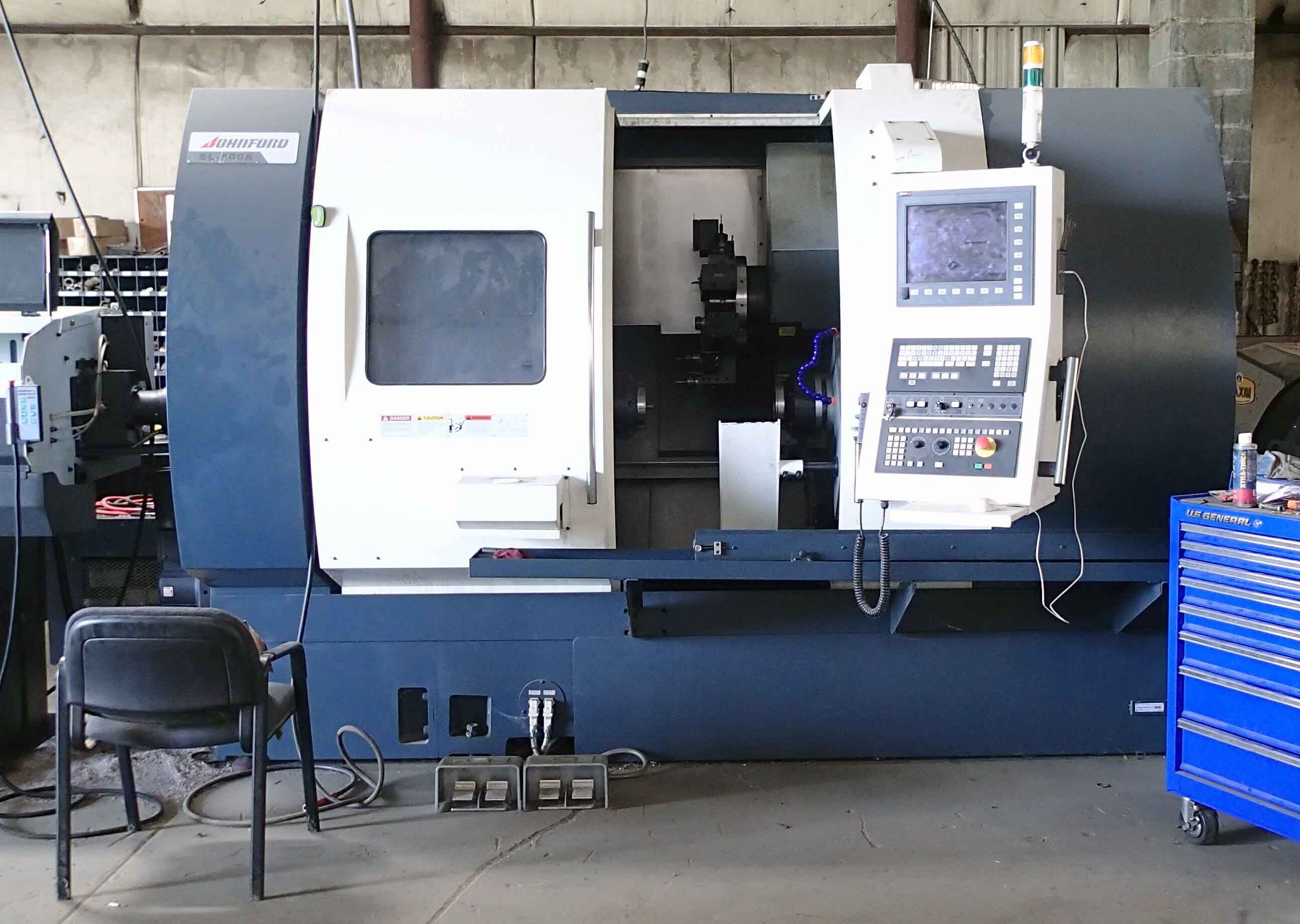 Johnford #SL-500A, CNC turning center, 22.8" swing, 31" centers, 12" chuck, 4" bar, 35 HP, 2,800 RPM, Y-Axis