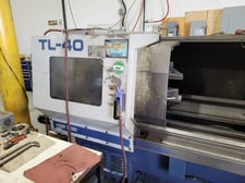 Mori Seiki #TL-40B, flat bed CNC lathe, 13.8" turning diameter, 116" Z, (2) 18" chucks, 4.6" bar, 40 HP
